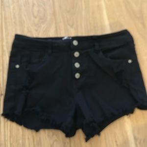 Black Altard State denim shorts.